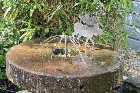 Brunnen.
