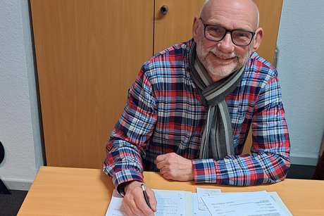 Sie sehen den Sozialberater Herr Jörgen Steinbrink