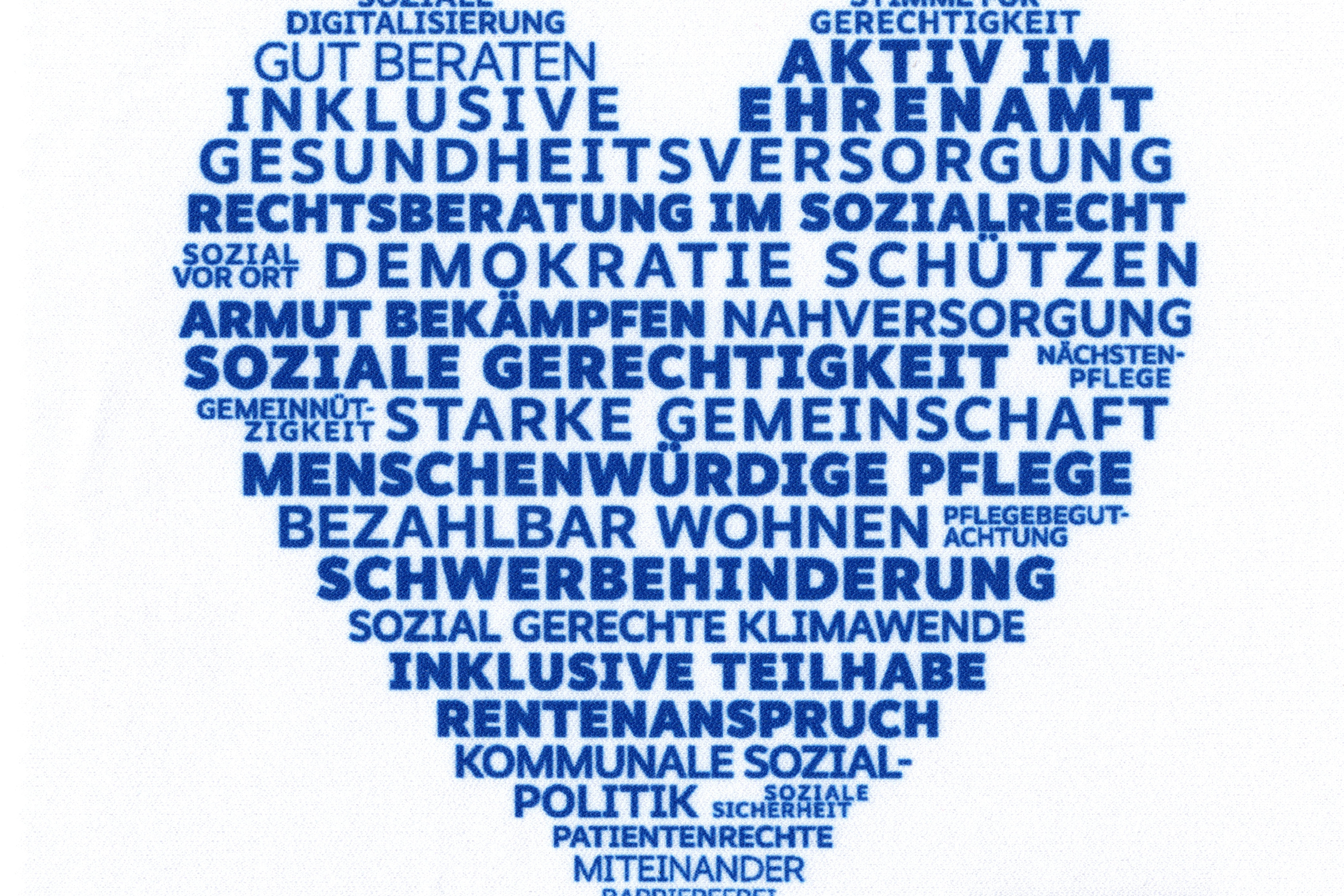 Ein blaues Herz mit Schlagw&ouml;rtern wie Gesundheitsversorgung oder Schwerbehinderung